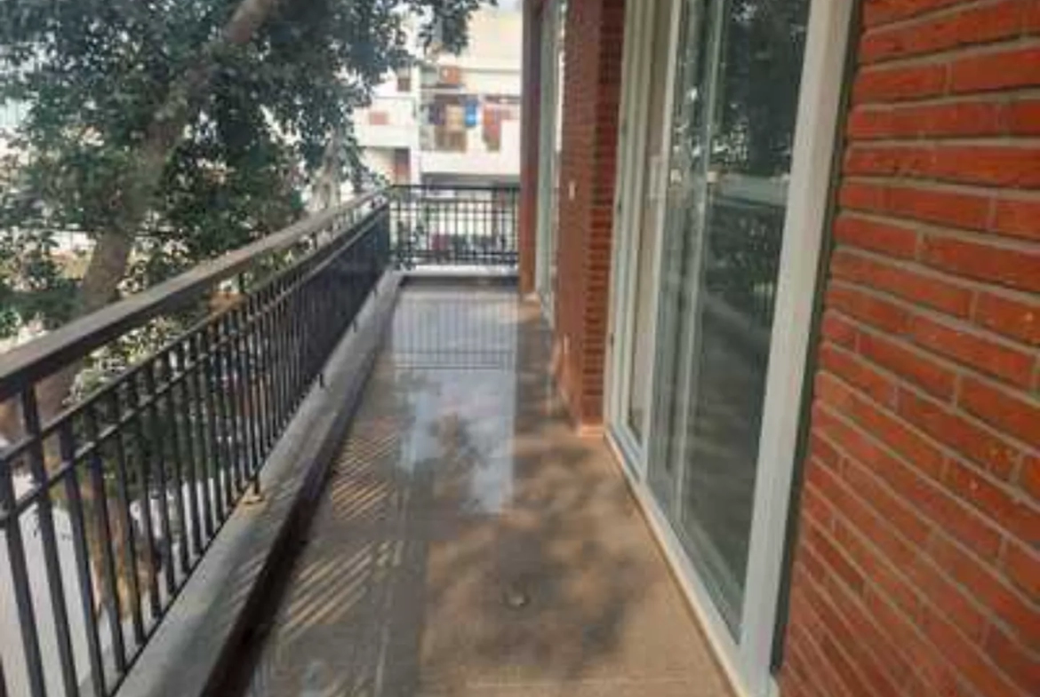 Image of the balcony of the apartment in the Greater Kailash-1 rental listing.